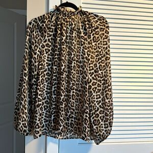 Animal Print long sleeve silk top. Front tie and frill round the neck.
